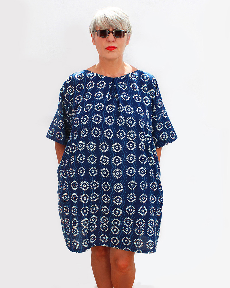 Fiona modelling the Hilda tunic in a summery blue cotton fabric with a pattern of white circles
